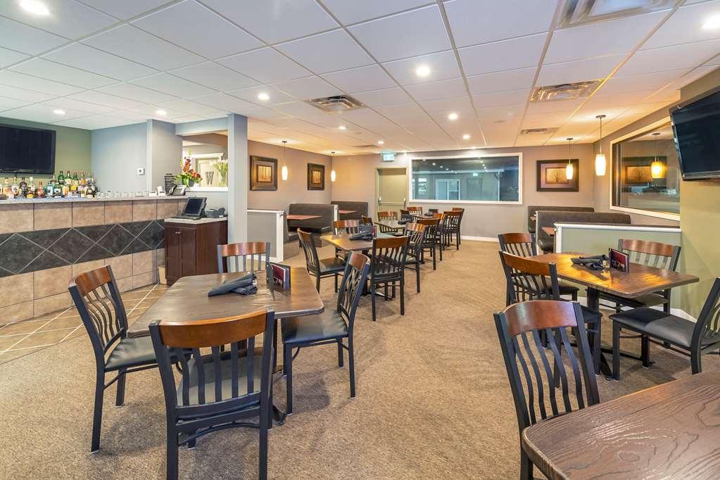 מדיסין הט Econo Lodge Inn & Suites מסעדה תמונה